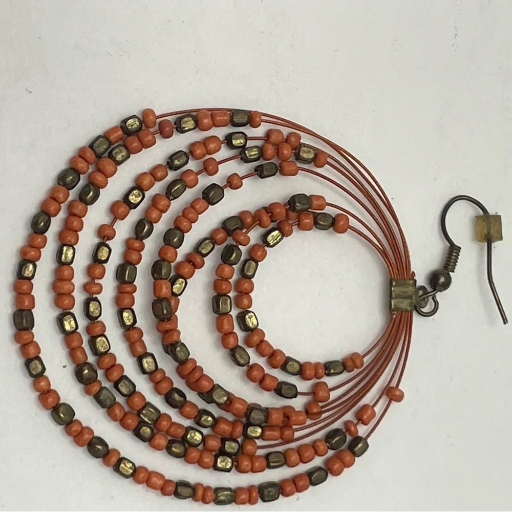 Coral and copper bead multi strand round drop earrings.